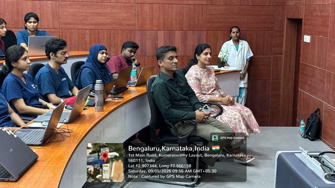 Faculty members and delegates seated during the workshop session